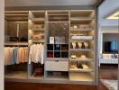 Elegant walk-in closet with ample shelving and organized wardrobe