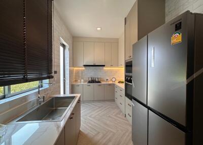 Modern kitchen with stainless steel appliances and ample cabinet space