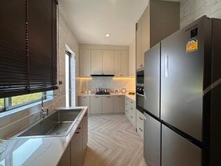 Modern kitchen with stainless steel appliances and ample cabinet space