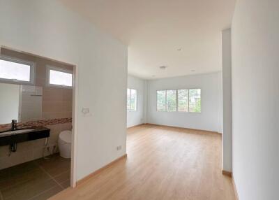 Spacious and bright living room with an open kitchen design