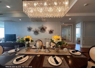Elegant dining room with modern lighting and decor