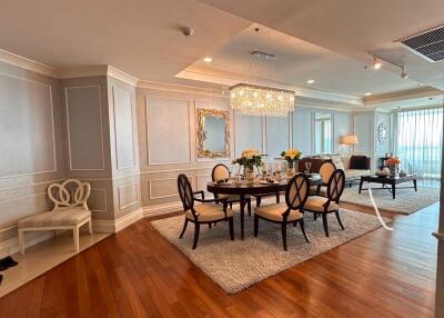 Elegant living room with dining area and hardwood flooring