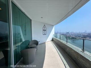 Modern balcony with city view and outdoor seating