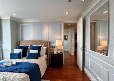 Elegant bedroom with en-suite bathroom in a modern apartment