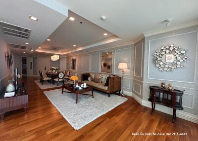 Spacious living room with contemporary furniture and hardwood floors