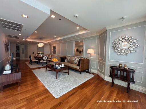 Spacious living room with contemporary furniture and hardwood floors