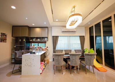 Modern open-concept living space with kitchen and dining area
