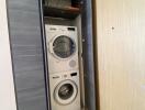 Compact in-home laundry area with modern washing machine