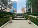 Modern building complex exterior with landscaped walkway