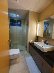 Modern bathroom with glass shower and vanity