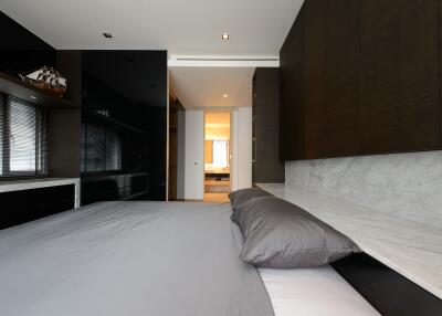 Modern bedroom interior with minimalistic design and soft lighting