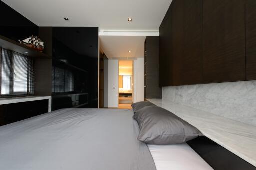 Modern bedroom interior with minimalistic design and soft lighting