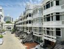 Elegant residential building facade with balconies and architectural details