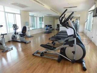 Spacious indoor gym with various exercise equipment