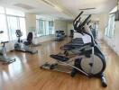 Spacious indoor gym with various exercise equipment