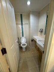 Modern bathroom interior with white fixtures