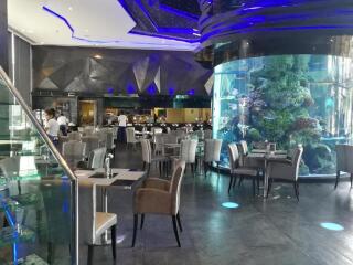 Modern restaurant interior with aquarium