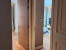 View into a cozy and welcoming bedroom through an open door