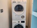 Stacked washer and dryer in a compact laundry room