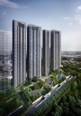 Exterior view of modern high-rise apartment buildings with lush greenery