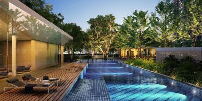 Luxurious outdoor pool area with lounge chairs and lush greenery