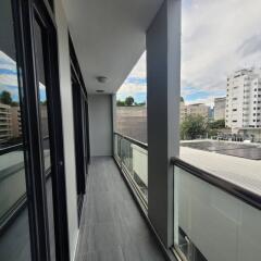 Spacious balcony with a city view