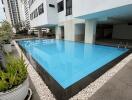 Modern swimming pool within a residential complex