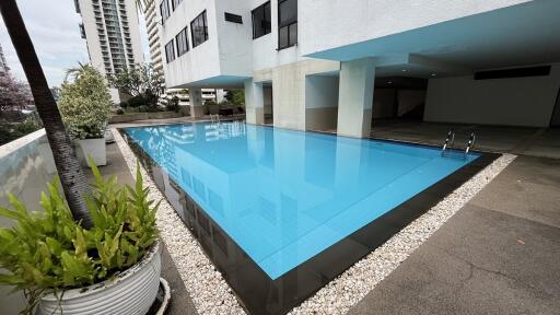 Modern swimming pool within a residential complex