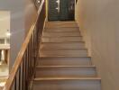 Modern staircase with wooden handrail and LED step lights