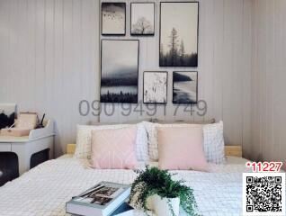 Cozy bedroom with well-decorated interior and wall art