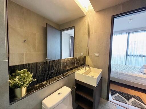 Modern bathroom interior with stone wall finish