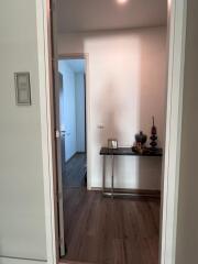 Spacious entryway with modern console table and decorative vases