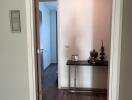 Spacious entryway with modern console table and decorative vases