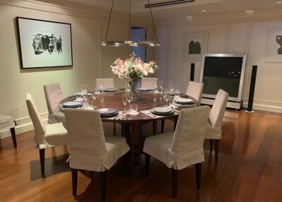 Elegant dining room with a large table set for dinner