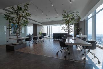 Spacious modern office with large windows and city view