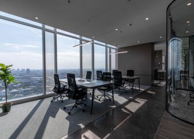 Modern office space with large windows and city view