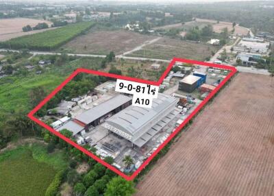 Aerial view of commercial property with marked boundaries