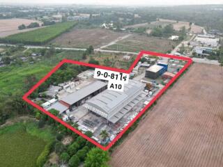 Aerial view of commercial property with marked boundaries