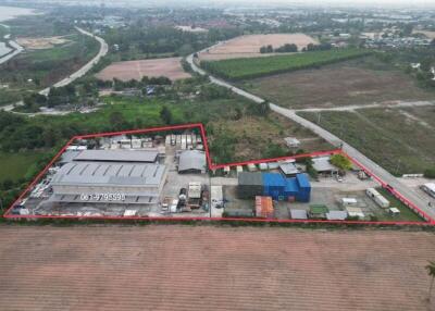 Aerial view of an industrial property with marked boundaries