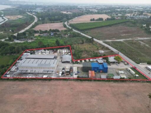 Aerial view of an industrial property with marked boundaries