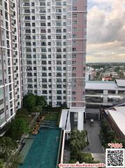 High-rise residential building with swimming pool and outdoor facilities