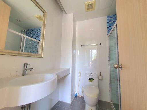 Modern bathroom interior with white walls
