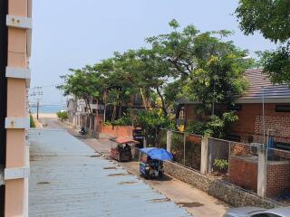 Street view with trees and houses