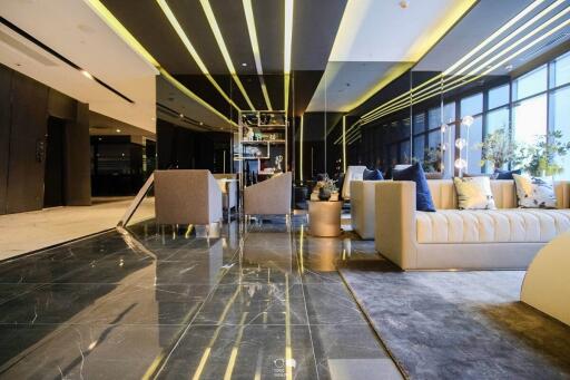 Modern lobby interior with comfortable seating and stylish lighting