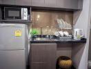 Modern compact kitchen with integrated appliances