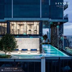 Luxurious high-rise building with rooftop pool and city skyline view