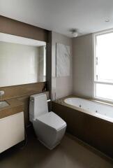 Spacious modern bathroom with natural light