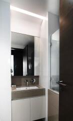 Modern bathroom with LED mirror lighting