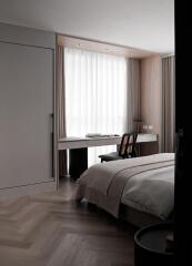 Modern bedroom with natural light and wooden finishes