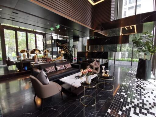 Modern hotel lobby with luxurious furniture and elegant design